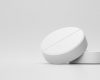 white-tablets-painkillers-with-pharmacy-medical-background-white-pills-alleviating-illness-fever-3d-rendering